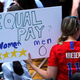 Women's World Cup Champions Parade - New York, United States - July 10, 2019 A fan displays a sign during the parade.